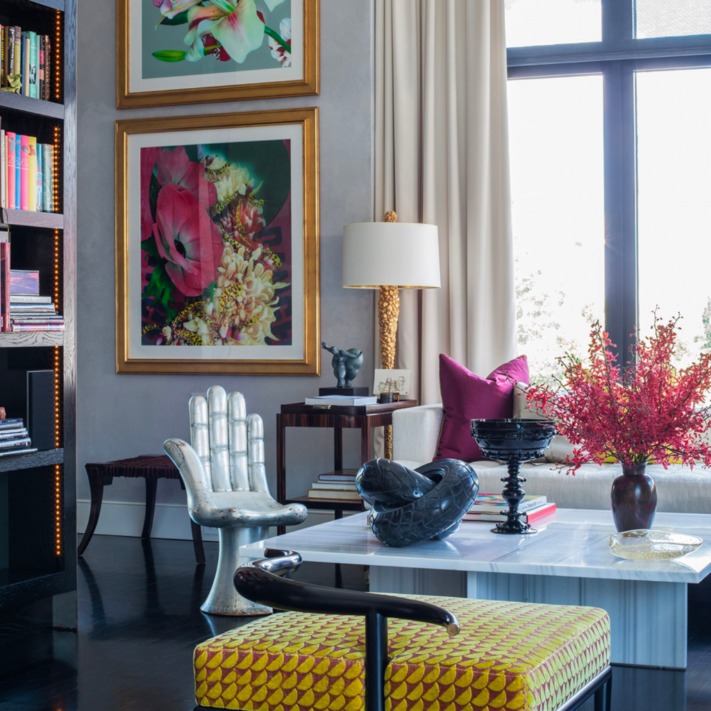 Colorfully designed living room with curated art and sculptures.