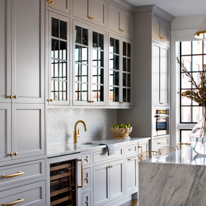A beautiful kitchen designed by an interior designer with muted grey tones.