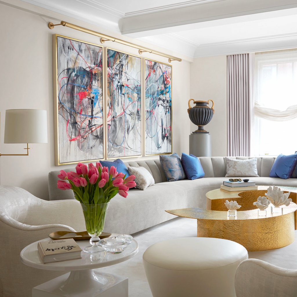 An interior designer in NYC has created a luxurious living room for this project that effortlessly blends sophistication with vibrant colors. The light colors blend beautifully with the contrasting color palette.